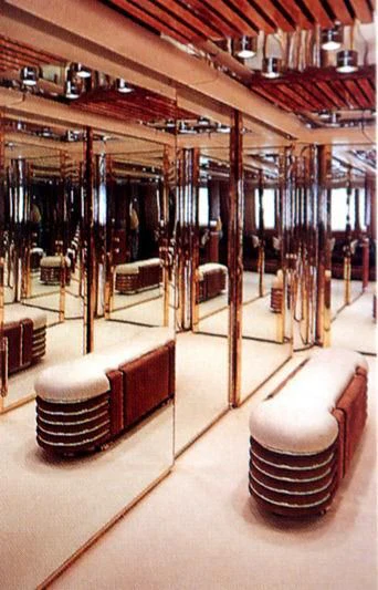 a large room with chairs and a table aboard KINGDOM 5KR Yacht for Sale