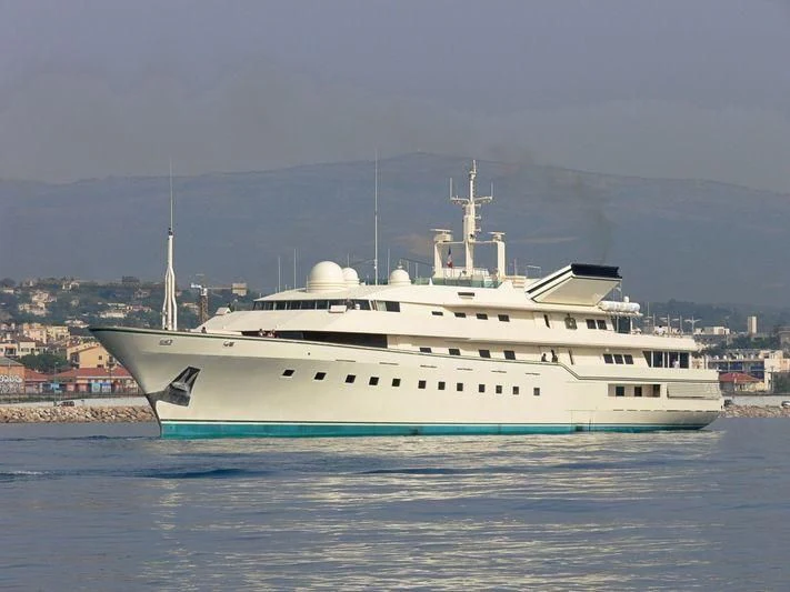 a large white ship aboard KINGDOM 5KR Yacht for Sale