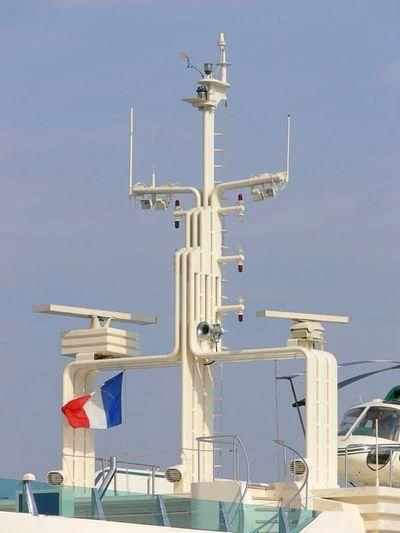 a large white ship with a flag on it aboard KINGDOM 5KR Yacht for Sale