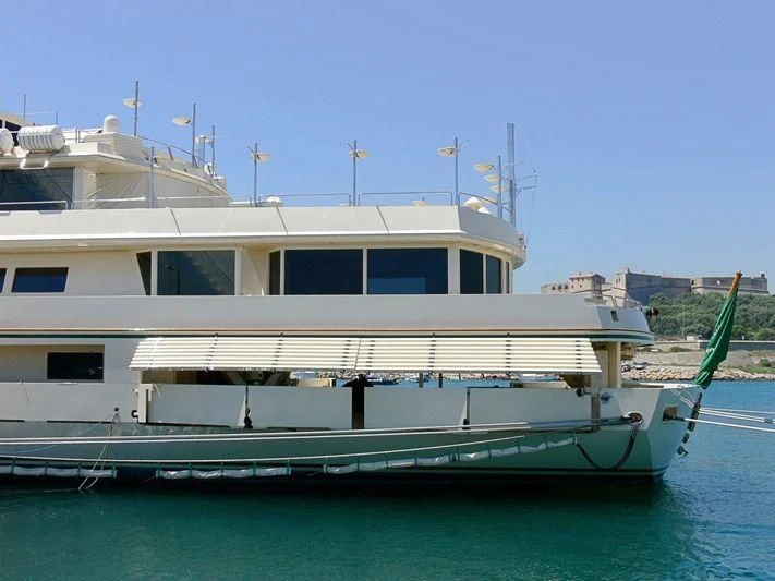 a white boat in the water aboard KINGDOM 5KR Yacht for Sale