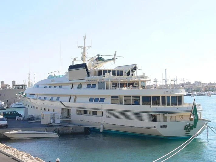 a large white ship aboard KINGDOM 5KR Yacht for Sale
