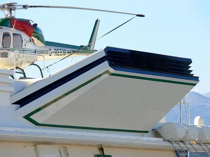 a helicopter on a boat aboard KINGDOM 5KR Yacht for Sale