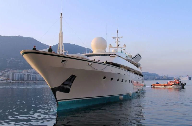 a large white ship in the water aboard KINGDOM 5KR Yacht for Sale