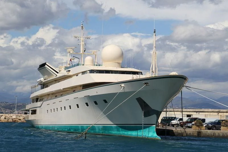 a large white ship aboard KINGDOM 5KR Yacht for Sale