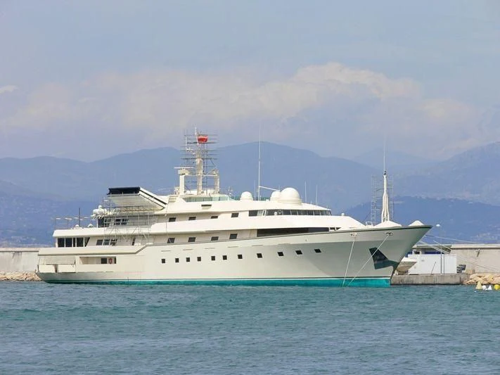 a large white ship in the water aboard KINGDOM 5KR Yacht for Sale