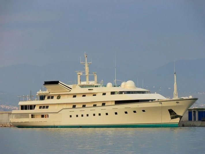 a large white ship aboard KINGDOM 5KR Yacht for Sale