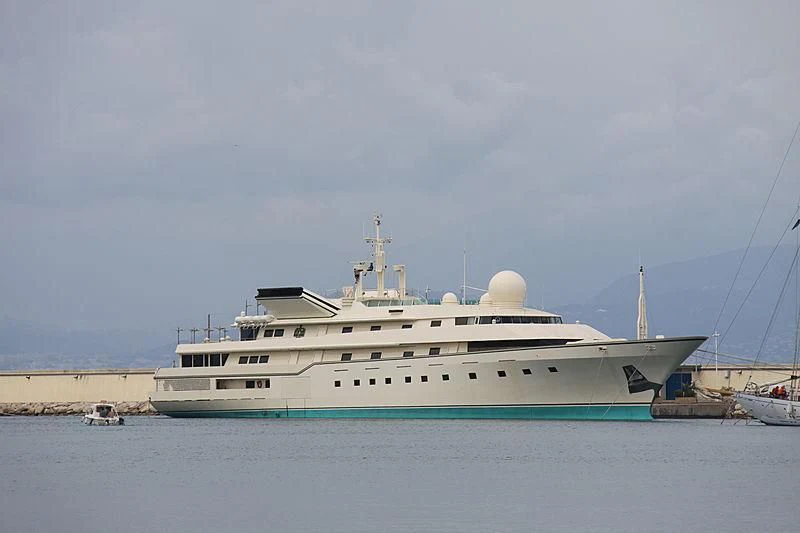 a large white ship in the water aboard KINGDOM 5KR Yacht for Sale