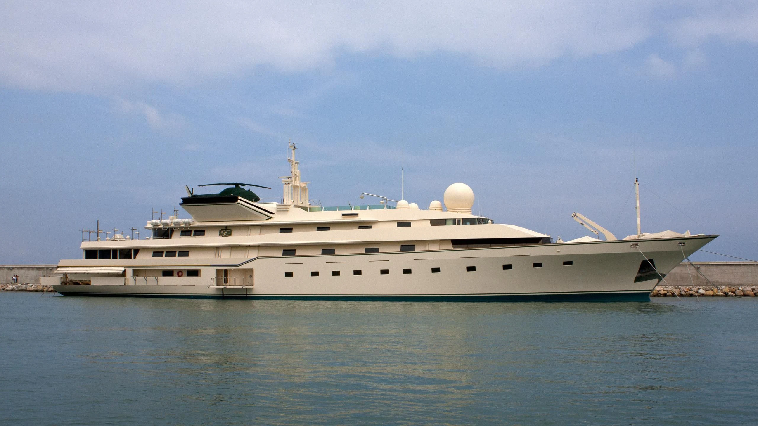 a large white ship aboard KINGDOM 5KR Yacht for Sale