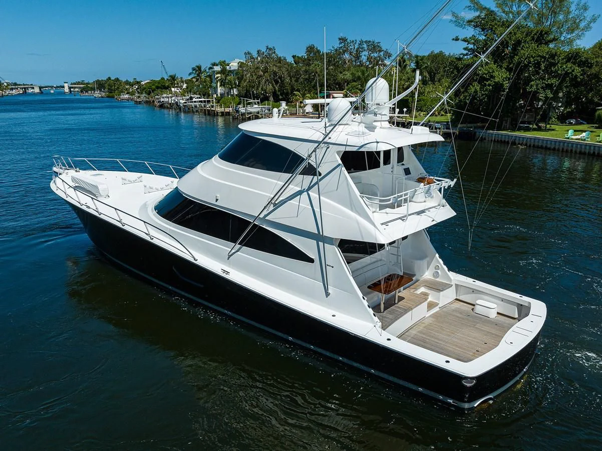 a white boat on water aboard 80' VIKING Yacht for Sale
