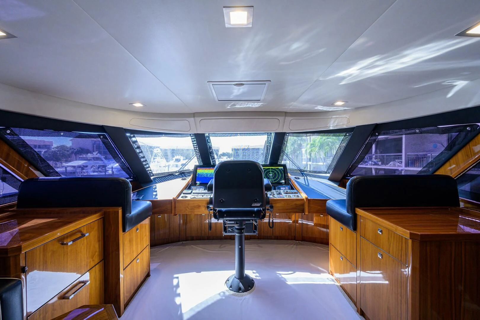a room with computers and televisions aboard 80' VIKING Yacht for Sale