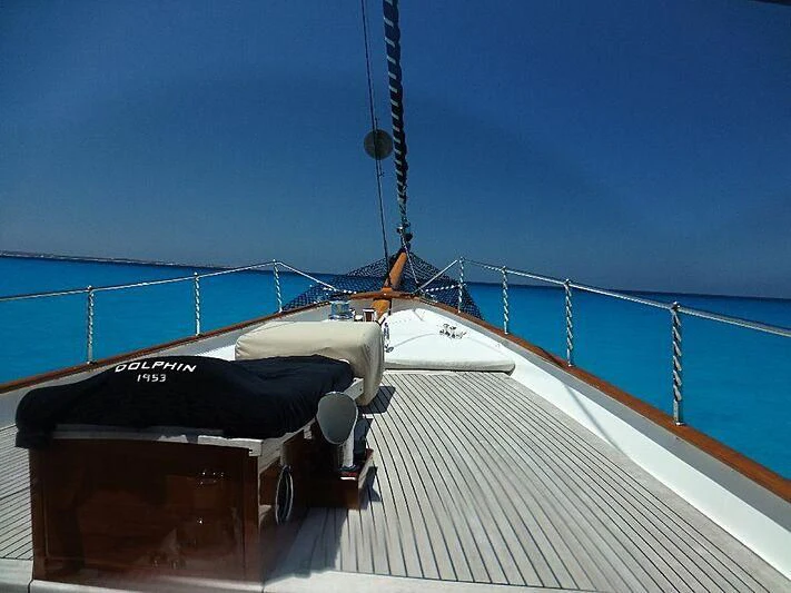 a boat on a deck aboard DOLPHIN Yacht for Sale