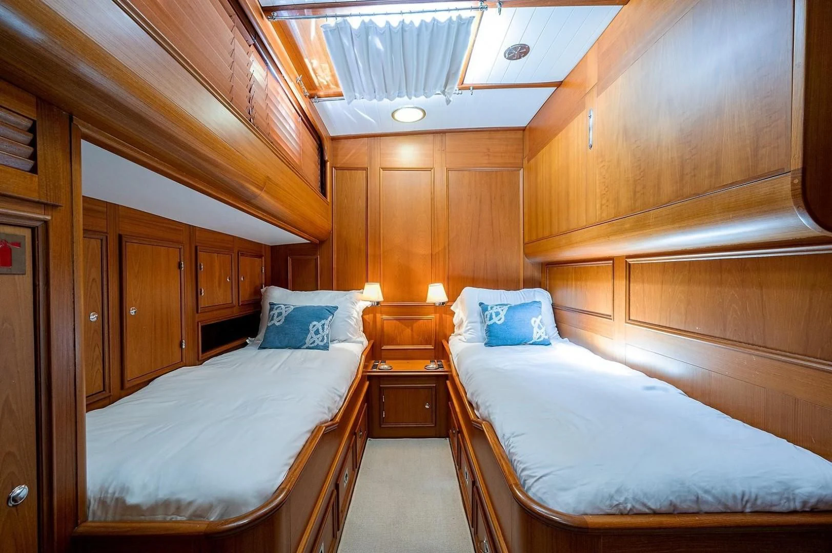 a room with two beds aboard ATALI Yacht for Sale