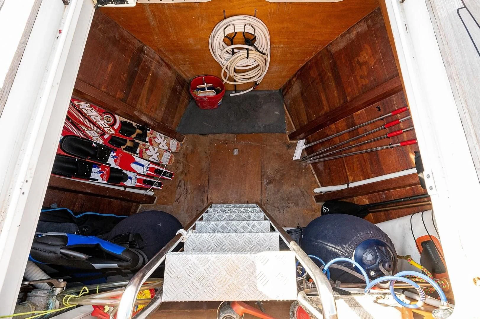 a room with a fan and a pile of clothes and a fan aboard ATALI Yacht for Sale
