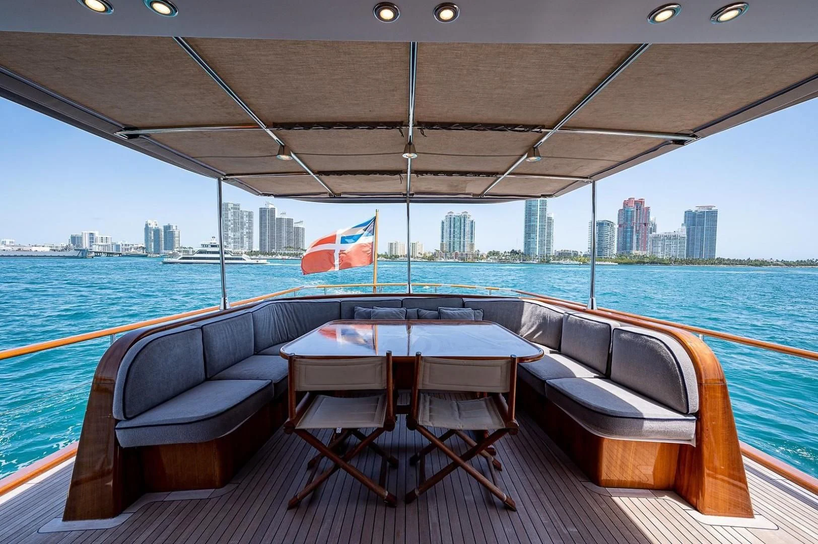 a table and chairs on a boat aboard ATALI Yacht for Sale