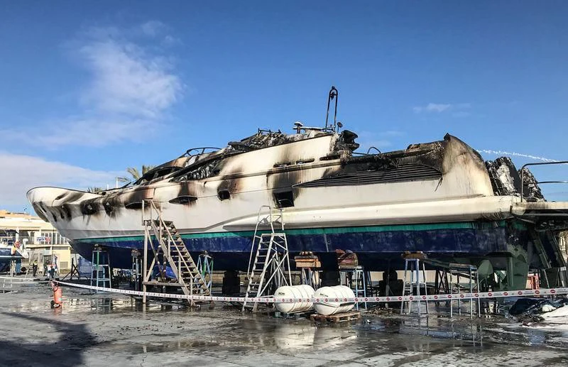 a large ship docked at a pier aboard ORDISI Yacht for Sale
