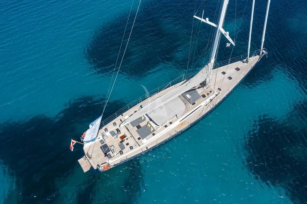 a large white boat in the water aboard FREEBIRD Yacht for Sale