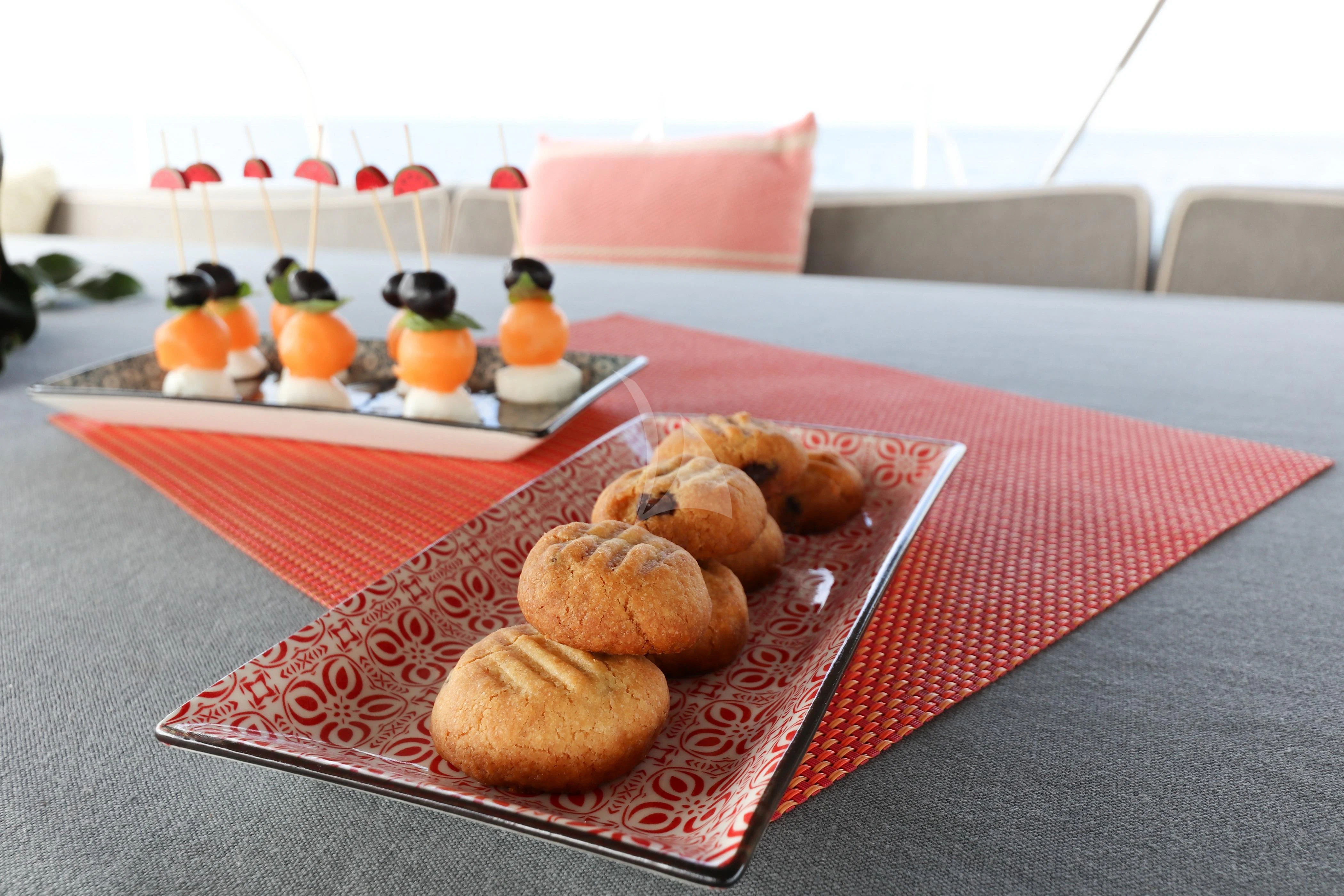 a plate of food aboard FREEBIRD Yacht for Sale