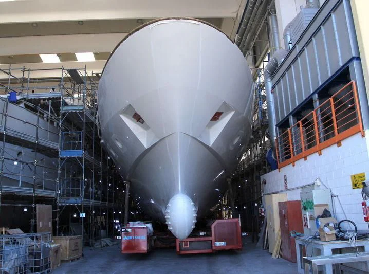 a large metal machine in a factory aboard ANYTHING GOES V Yacht for Sale