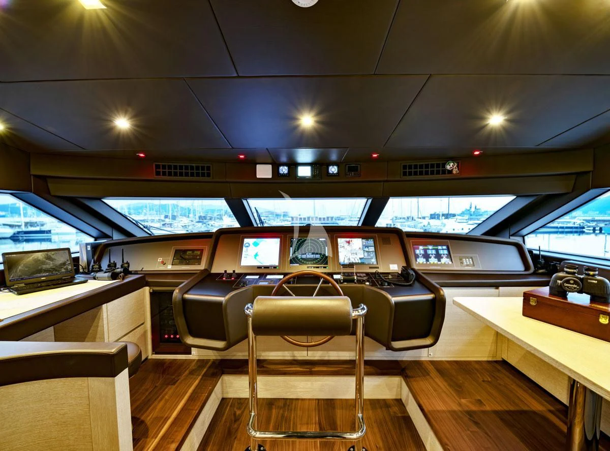 a bus with a desk and chairs aboard ANYTHING GOES V Yacht for Sale