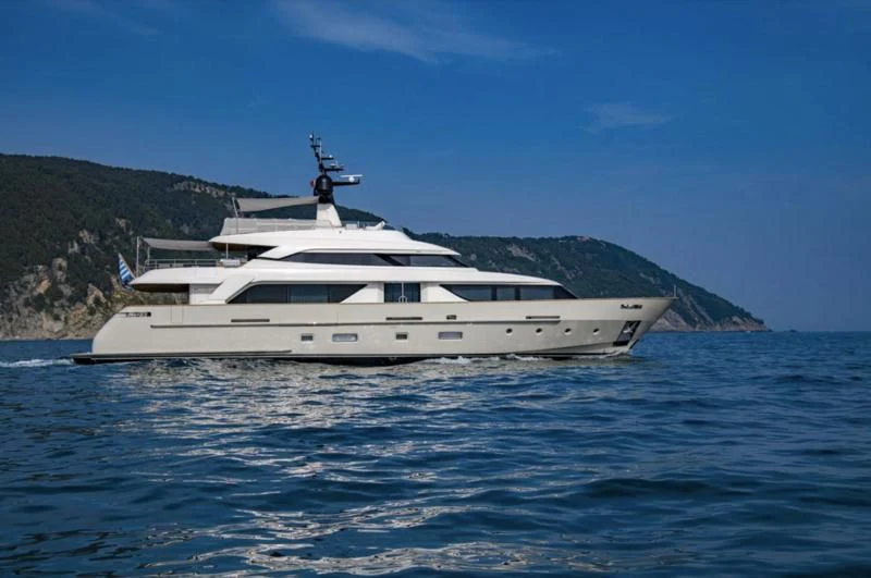 a white yacht in the water aboard ANYTHING GOES V Yacht for Sale
