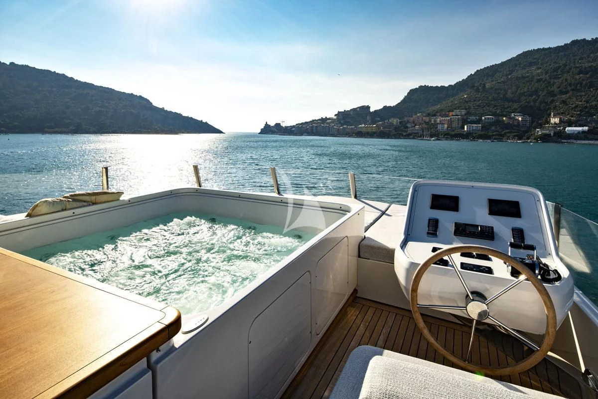 a boat on the water aboard ANYTHING GOES V Yacht for Sale