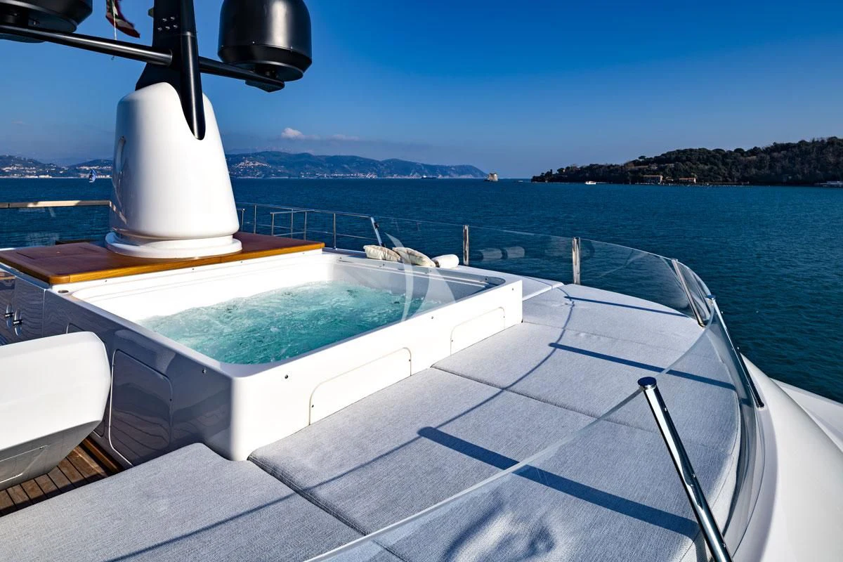 a boat on the water aboard ANYTHING GOES V Yacht for Sale