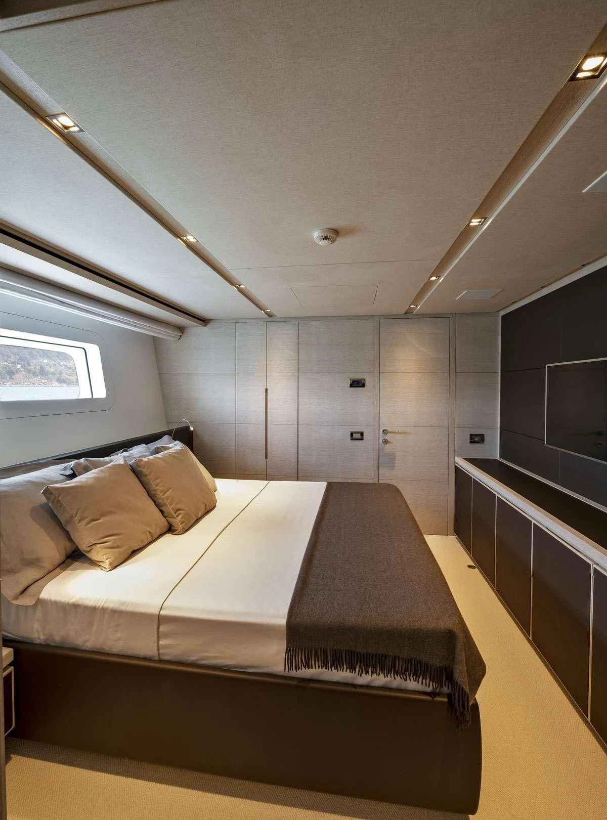 a bed in a room aboard ANYTHING GOES V Yacht for Sale