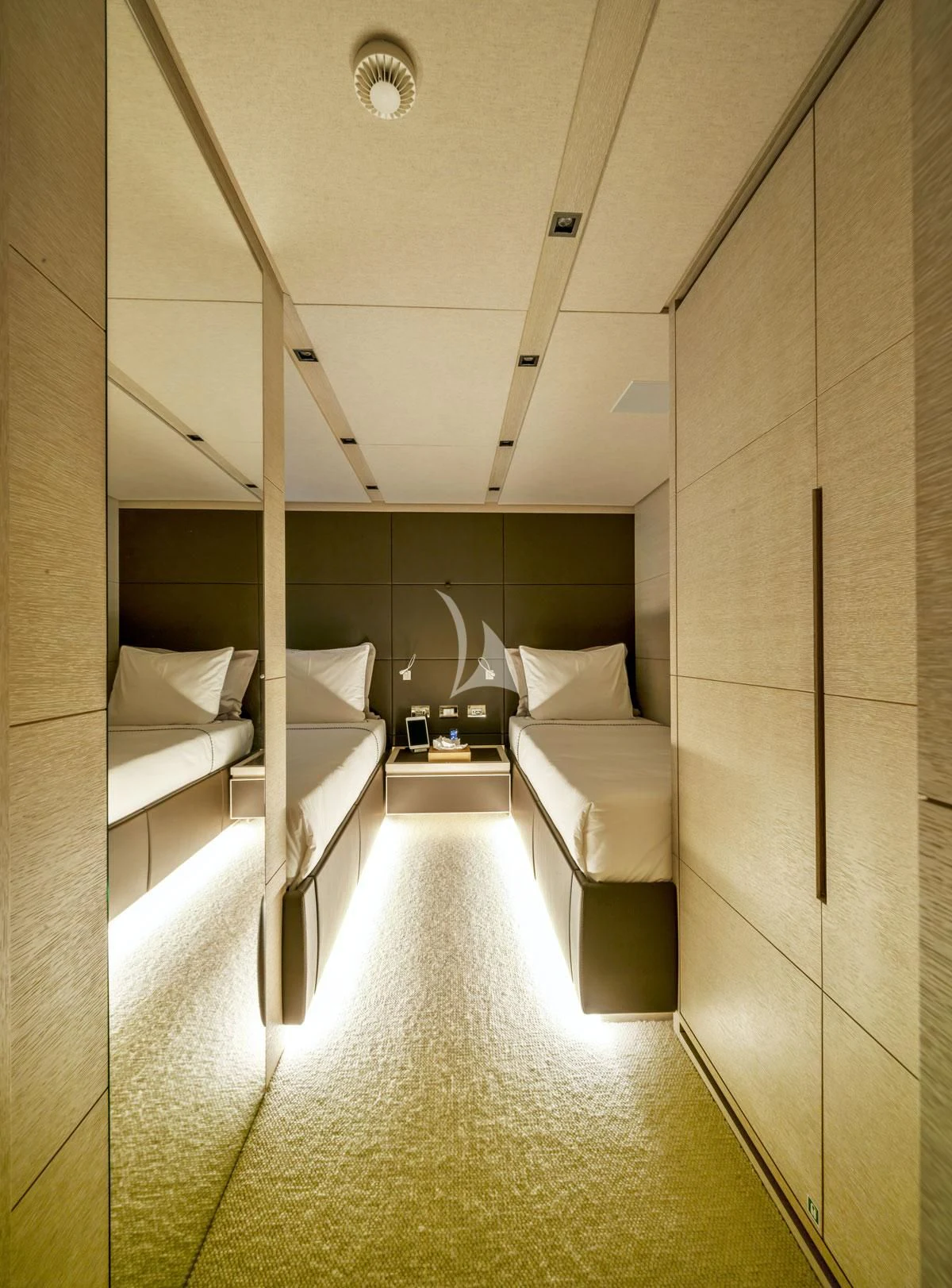 a room with a bed and a chair aboard ANYTHING GOES V Yacht for Sale