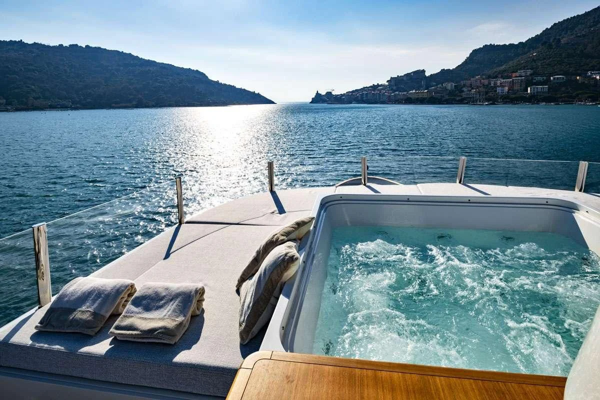 a boat on the water aboard ANYTHING GOES V Yacht for Sale
