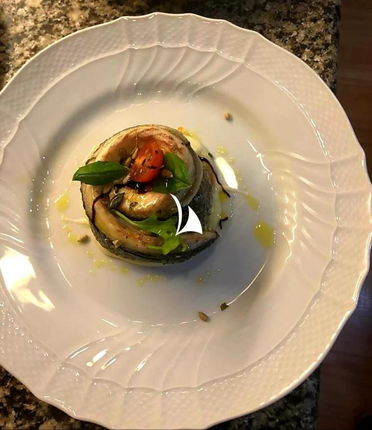 a plate of food aboard ANYTHING GOES V Yacht for Sale