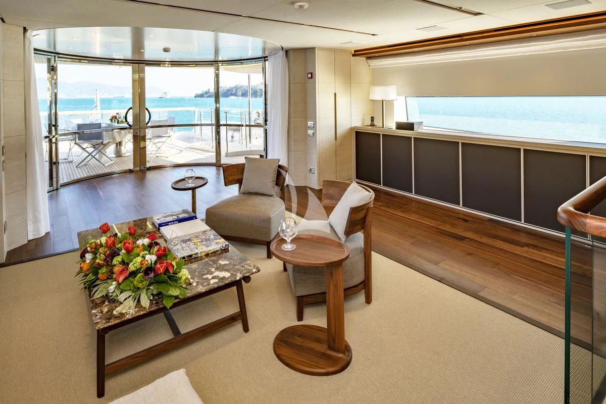 a living room with a large window aboard ANYTHING GOES V Yacht for Sale