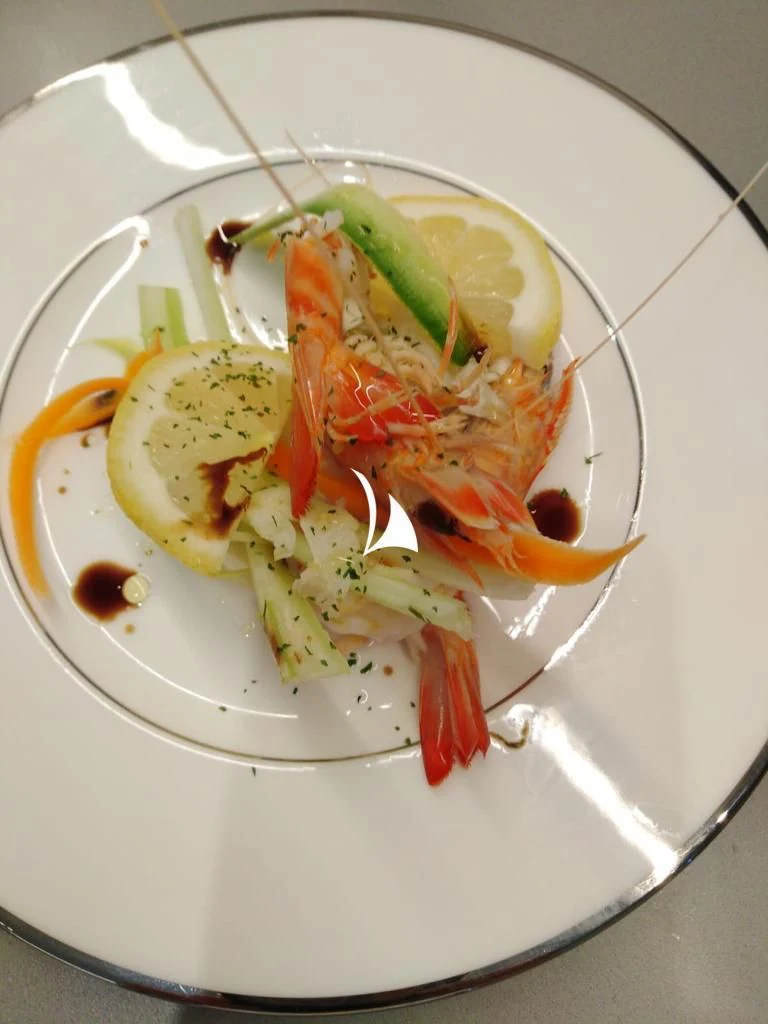 a plate of food aboard ANYTHING GOES V Yacht for Sale