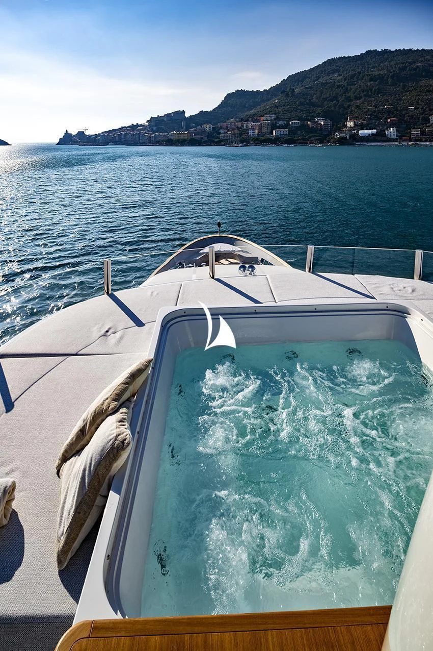 a boat on the water aboard ANYTHING GOES V Yacht for Sale