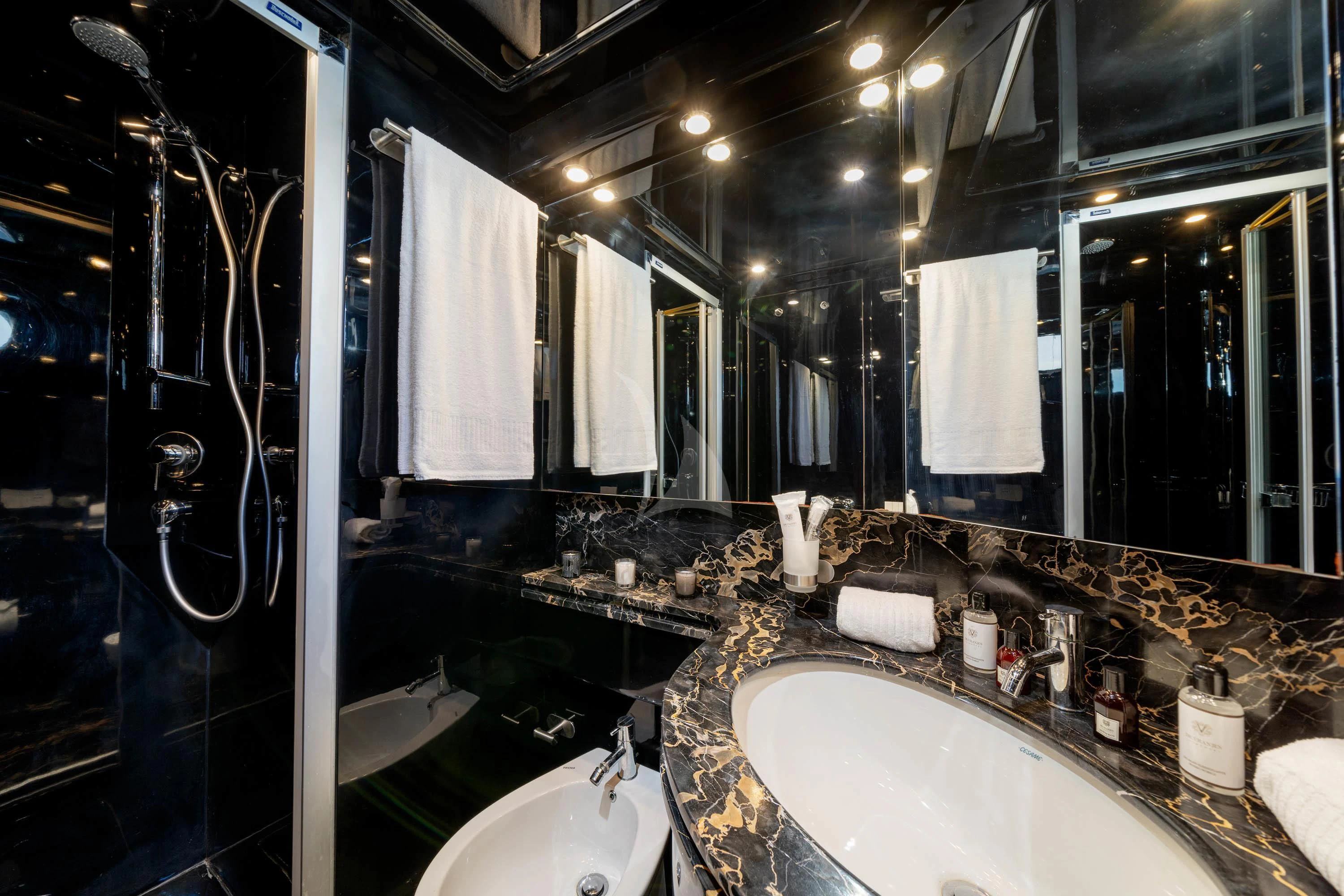 a bathroom with sinks and mirrors aboard GEMINI 3 Yacht for Charter
