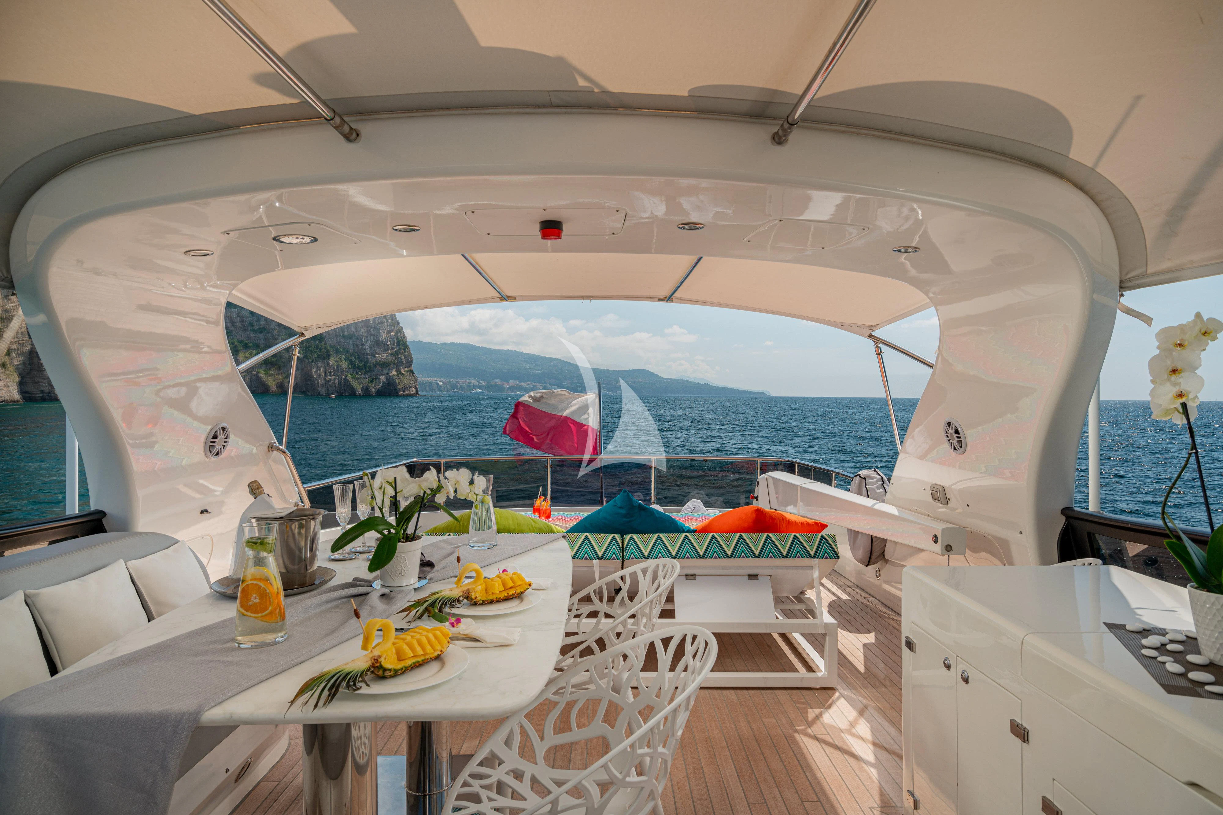 a room with a table and chairs aboard GEMINI 3 Yacht for Charter