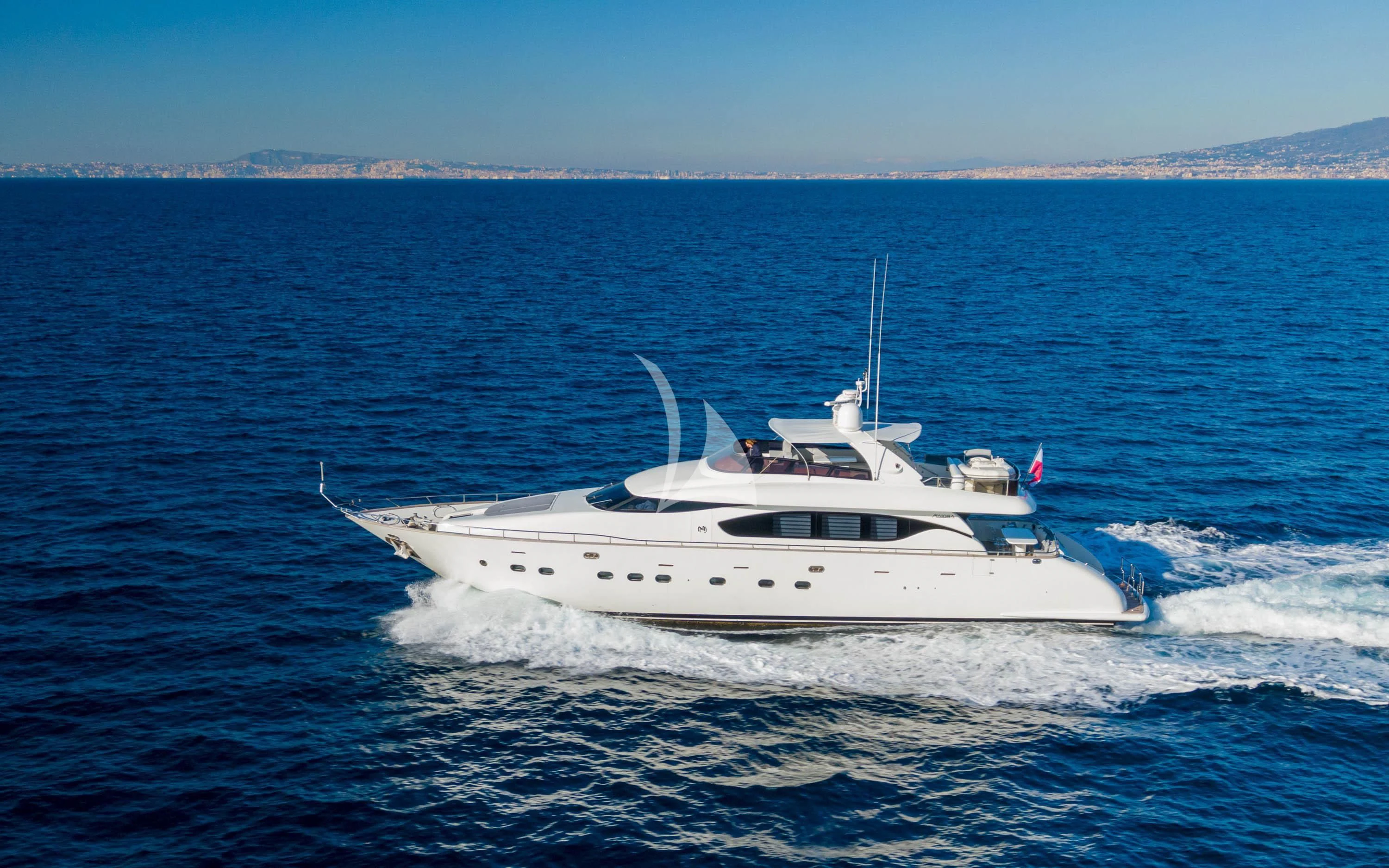 a white boat on the water aboard GEMINI 3 Yacht for Charter