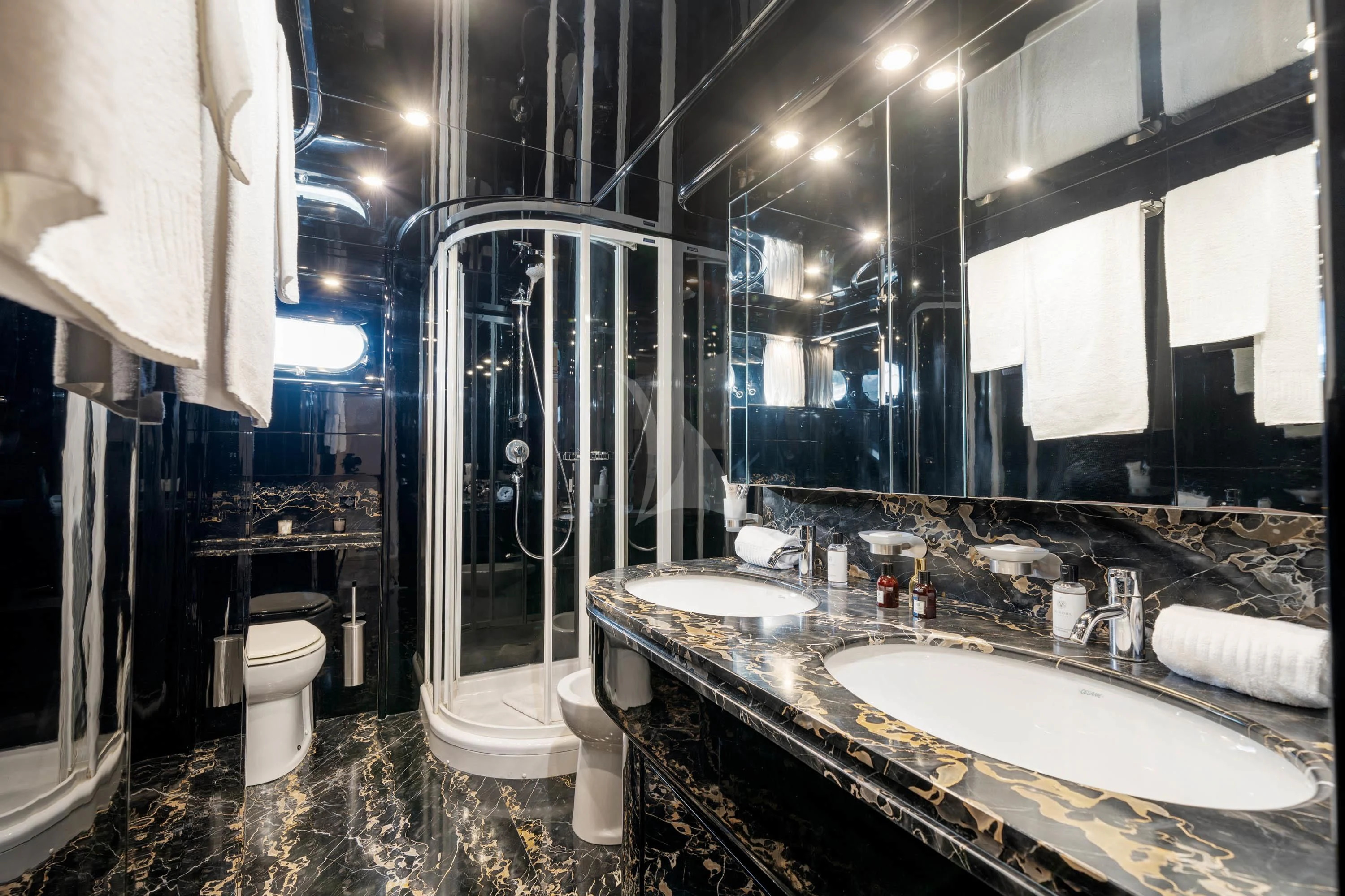 a bathroom with a shower and sink aboard GEMINI 3 Yacht for Charter