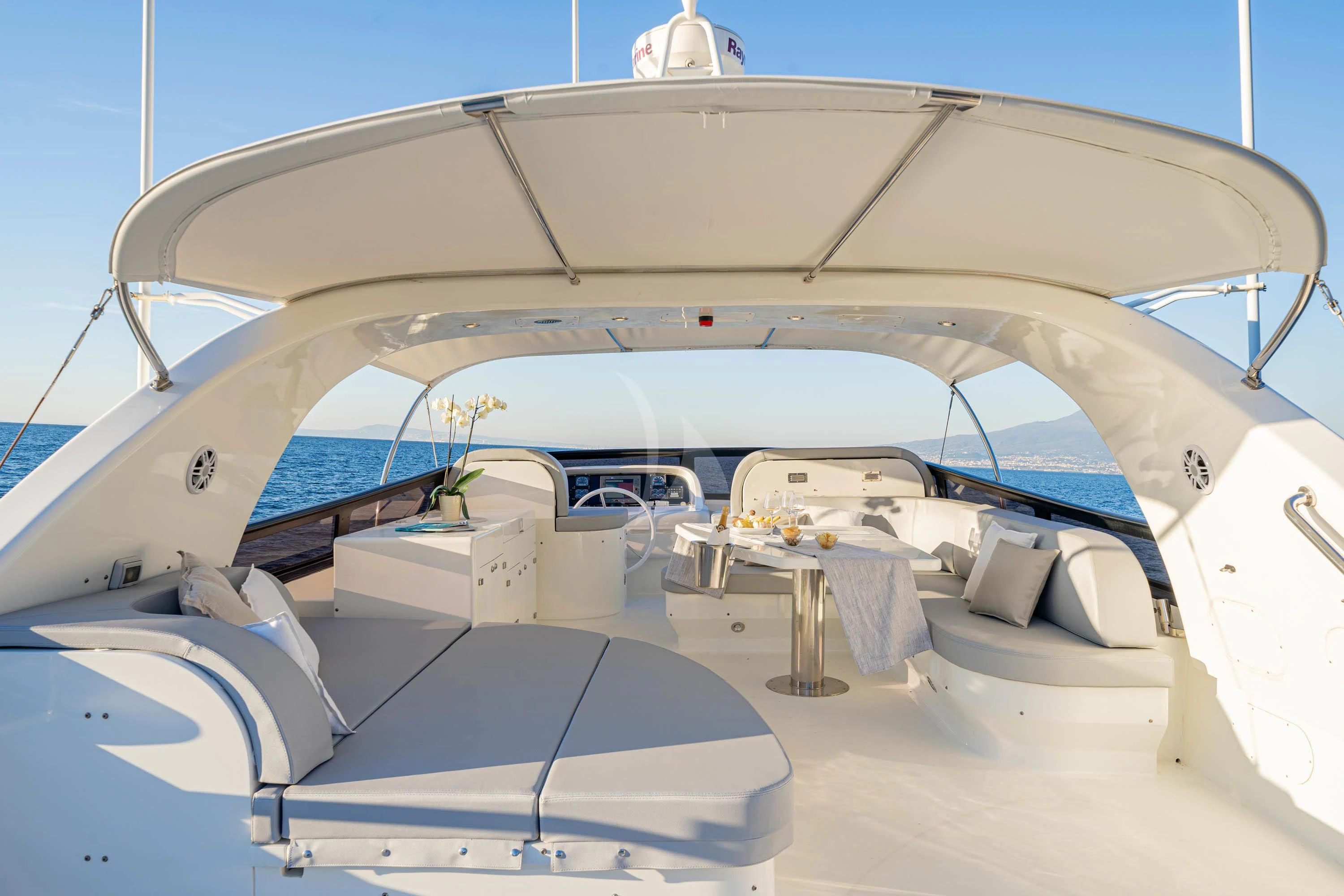 a close-up of a white airplane aboard GEMINI 3 Yacht for Charter