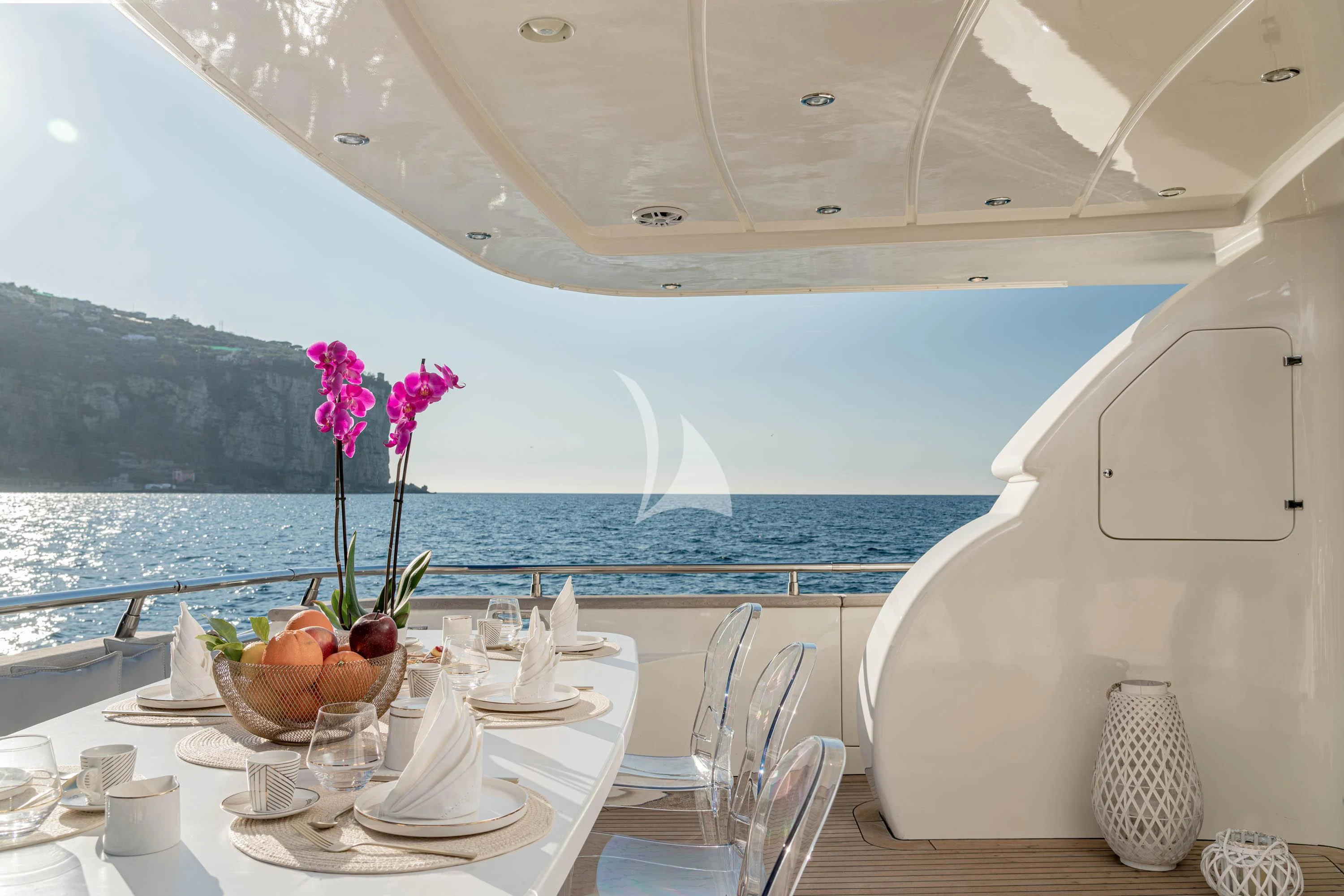 a flower on a table aboard GEMINI 3 Yacht for Charter