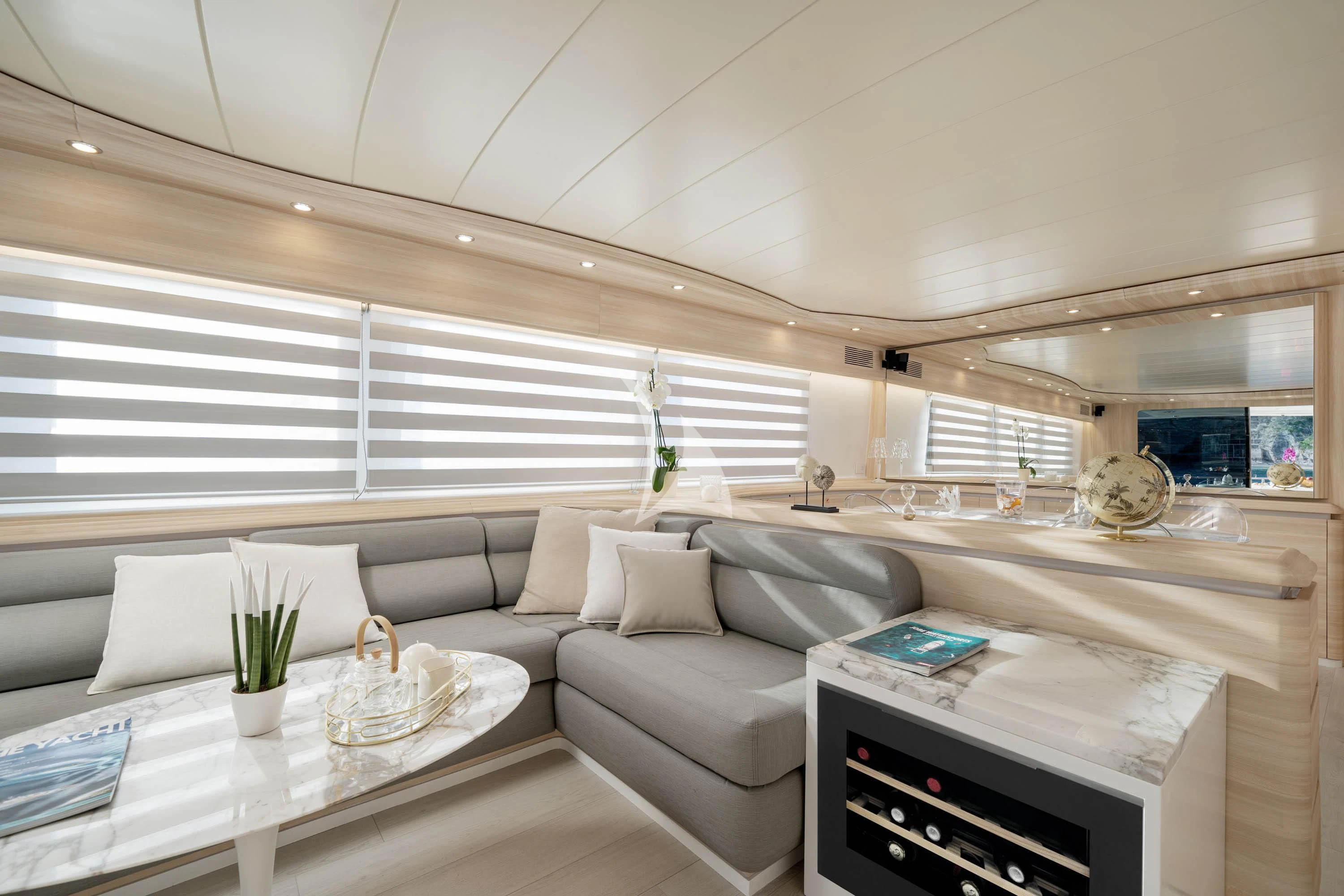 a living room with a white couch aboard GEMINI 3 Yacht for Charter