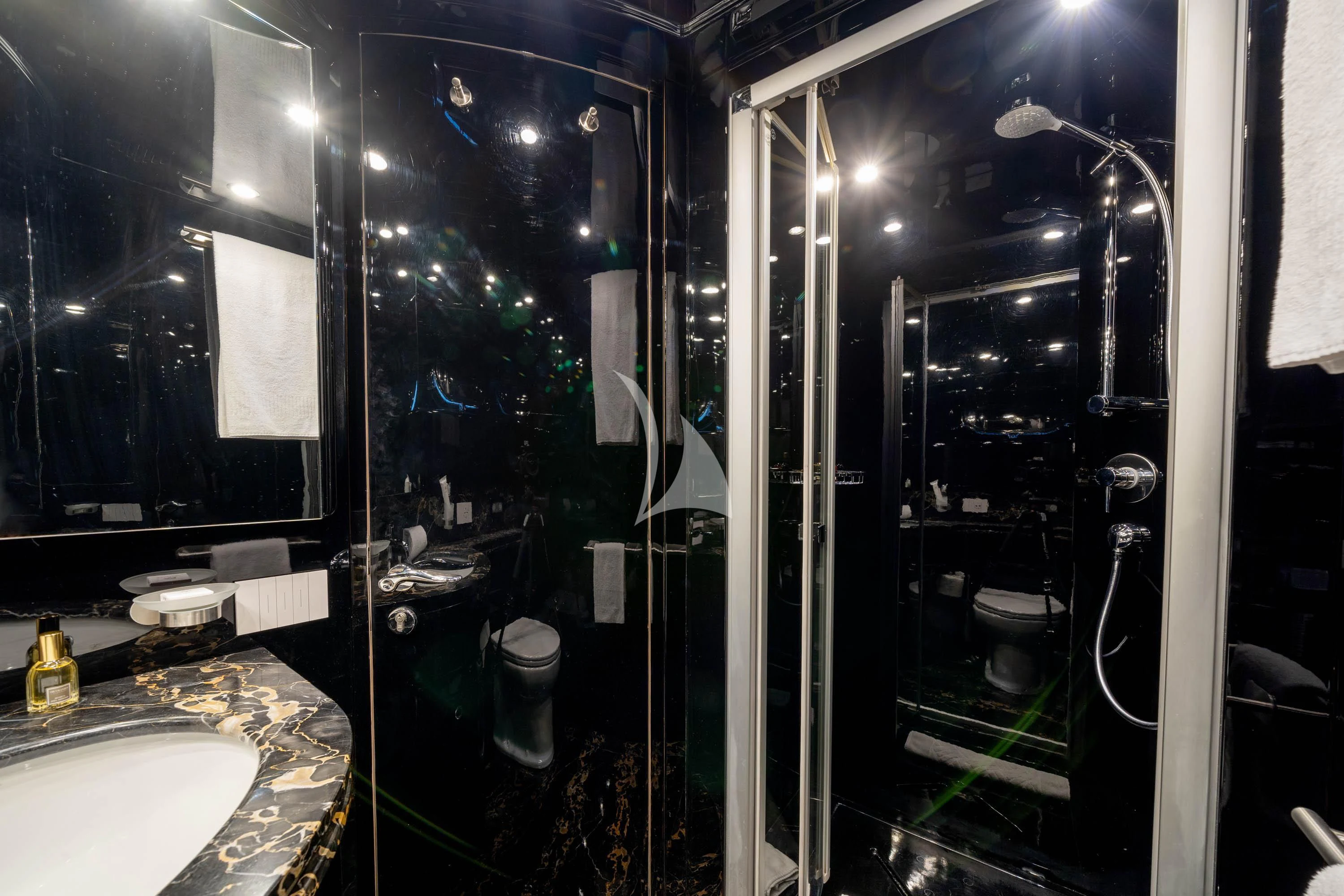 a bathroom with a large mirror aboard GEMINI 3 Yacht for Charter