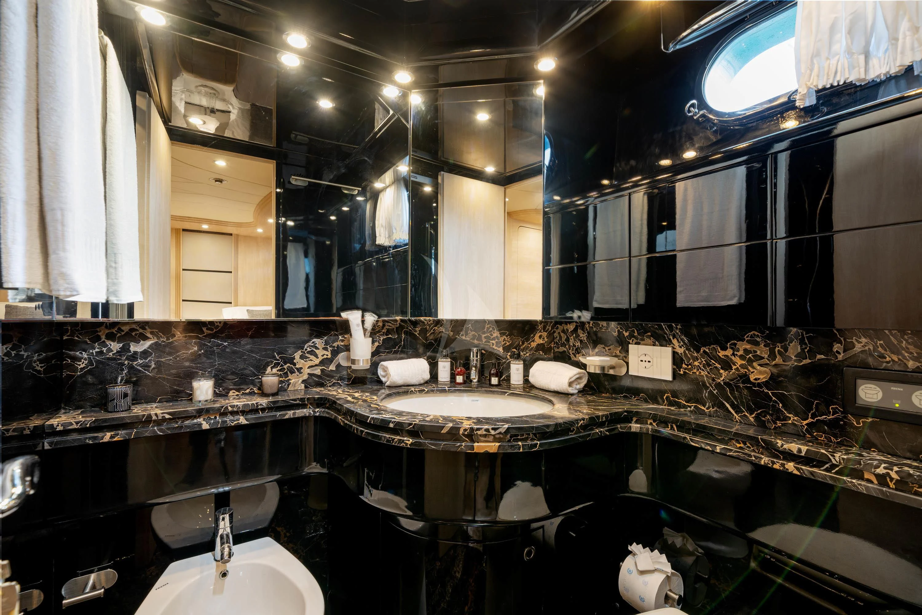 a bathroom with sinks and mirrors aboard GEMINI 3 Yacht for Charter