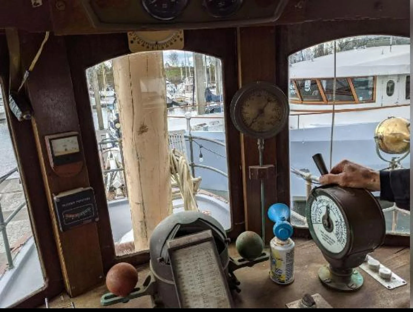 a room with a large clock and other objects aboard EL PRIMERO Yacht for Sale