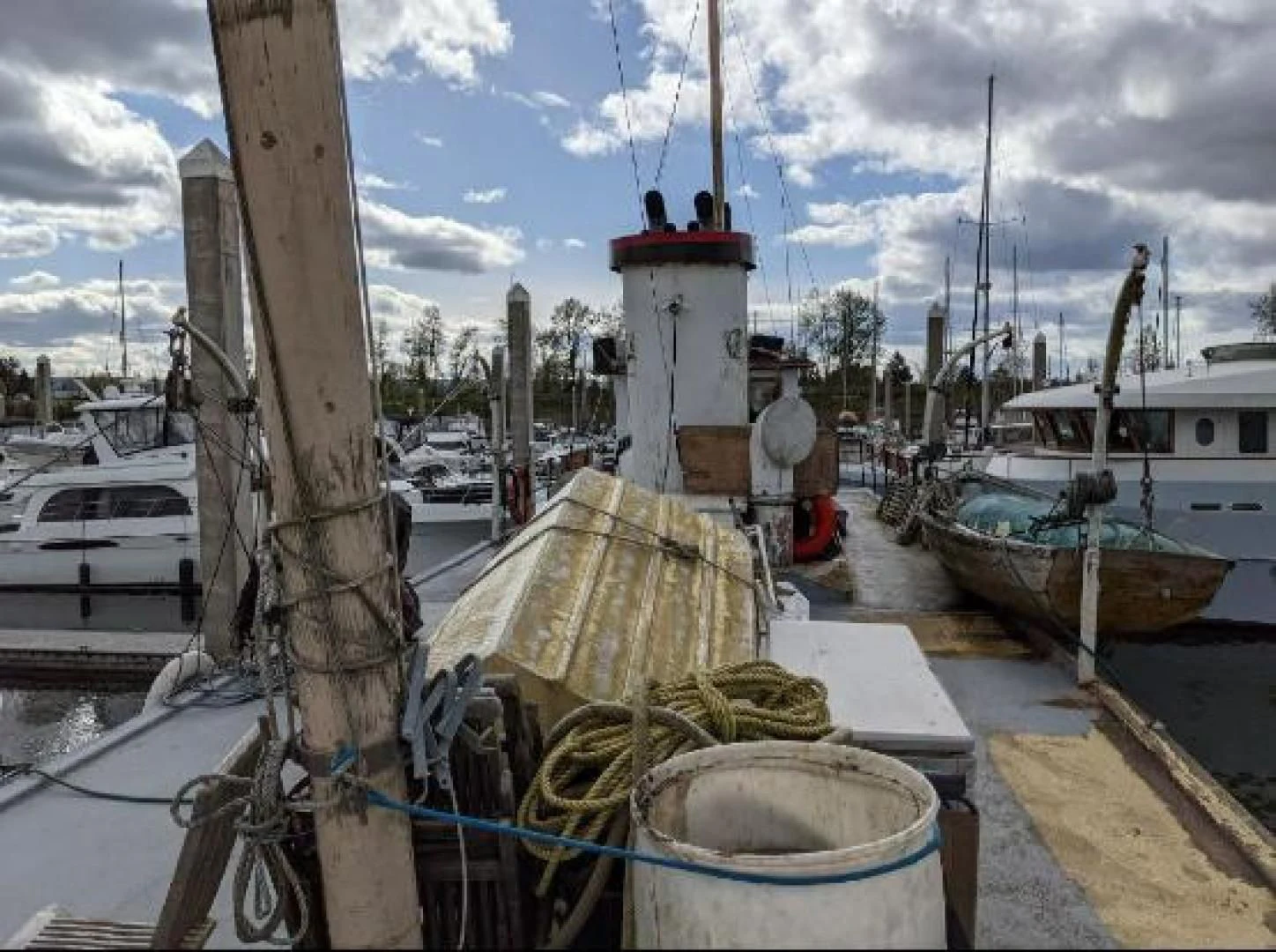 a boat tied to a dock aboard EL PRIMERO Yacht for Sale