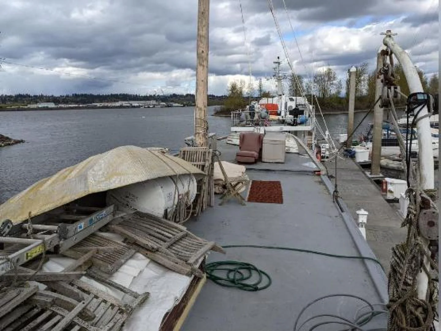 a dock with a boat and a dock aboard EL PRIMERO Yacht for Sale