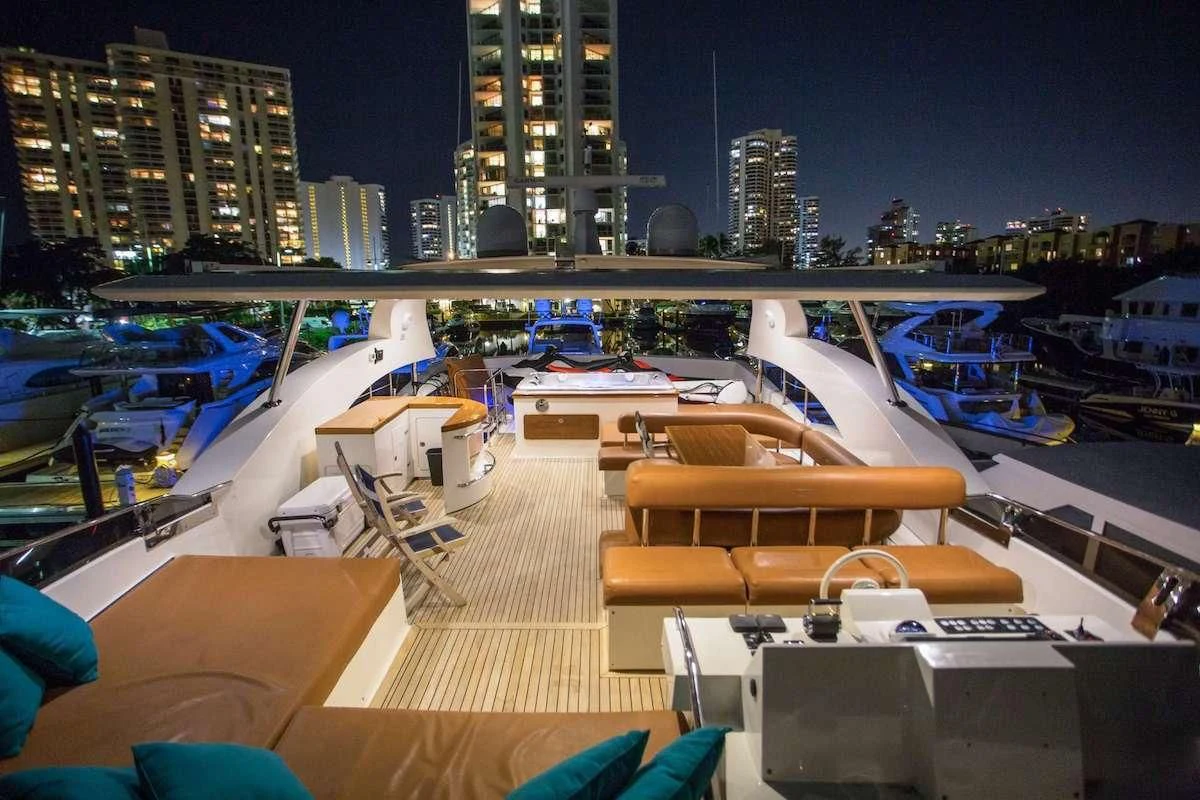 a boat dock with lounge chairs aboard BLUOCEAN Yacht for Sale