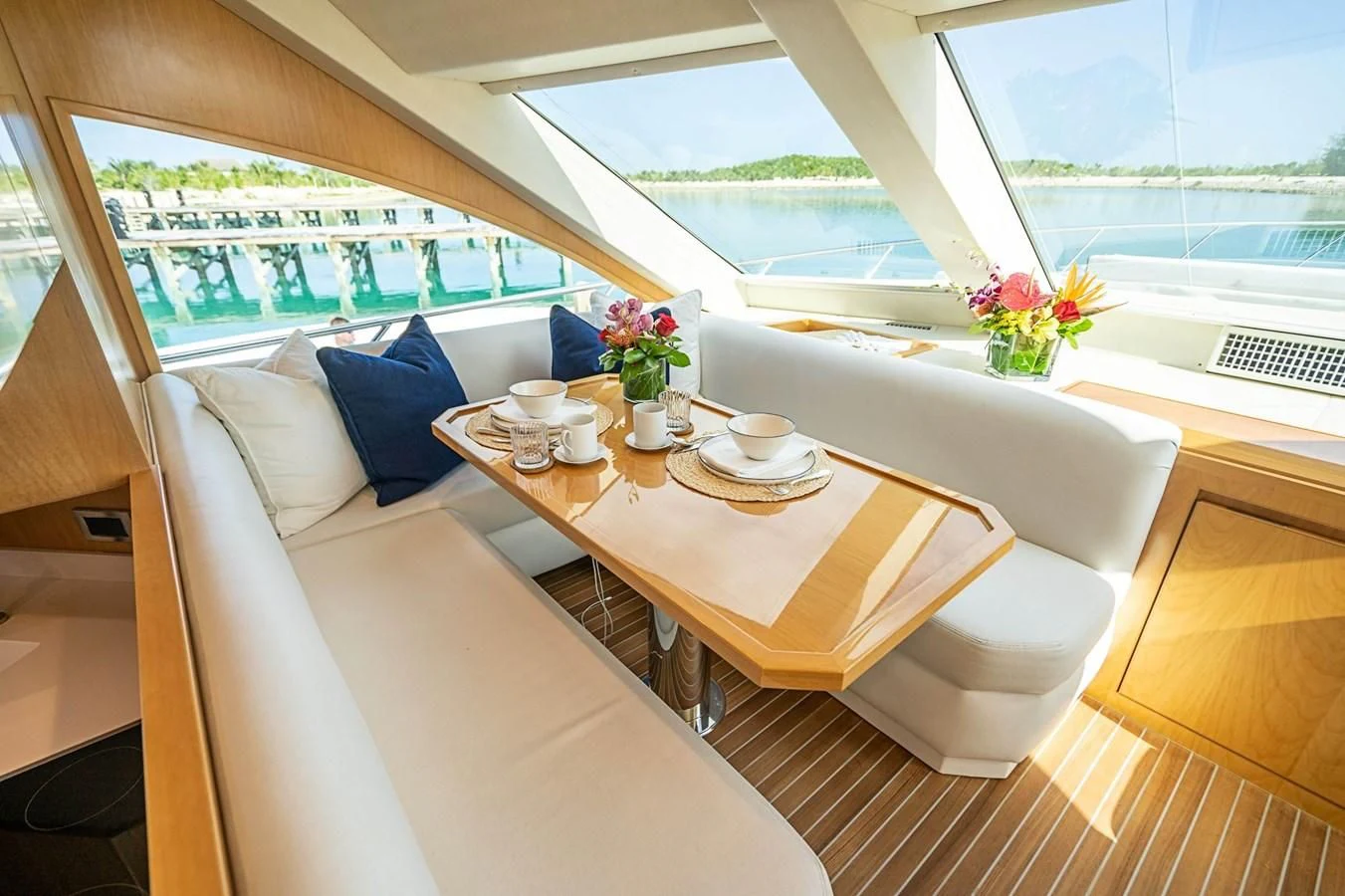 a room with a table and chairs aboard MARYBELLE Yacht for Sale