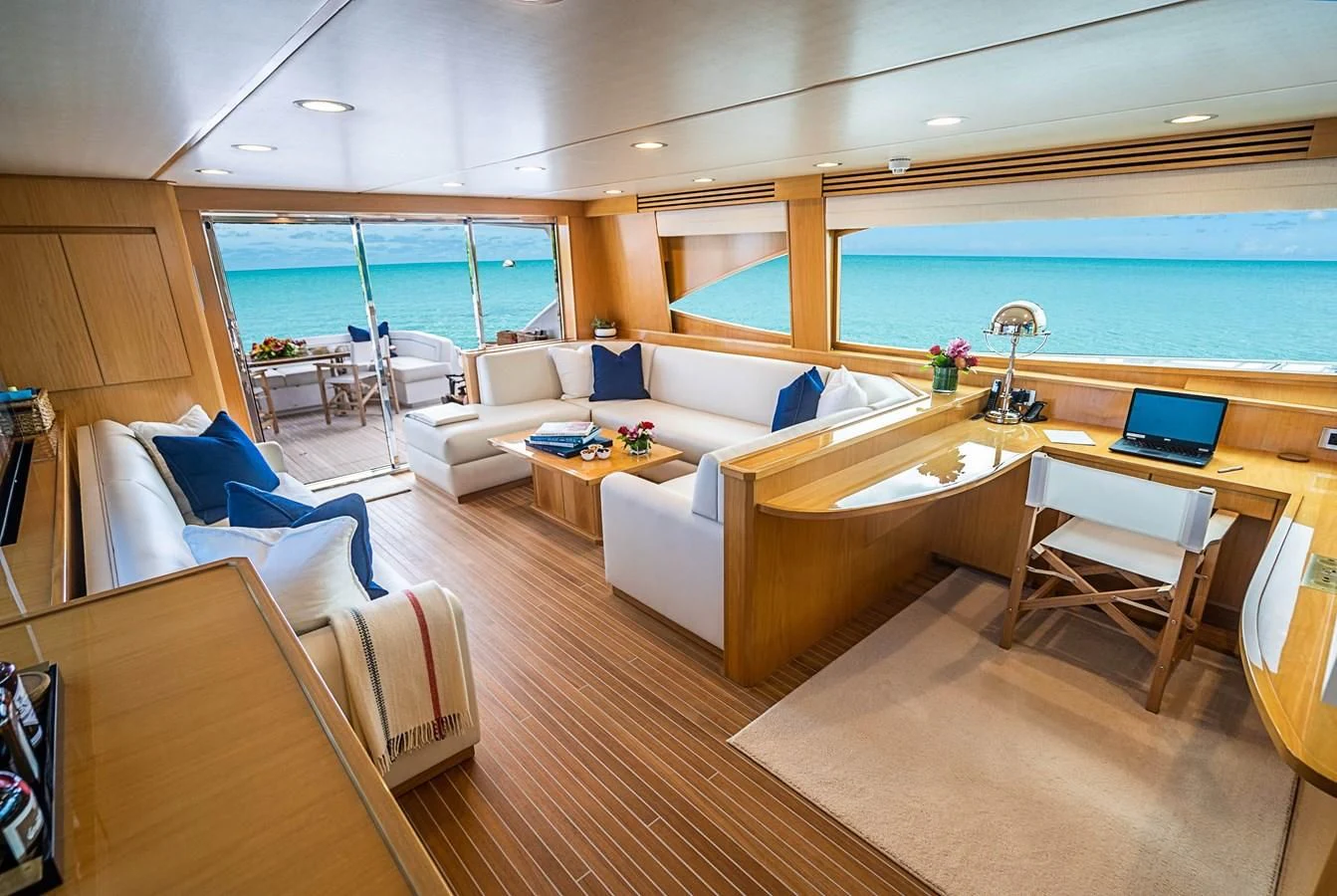 a living room with a large window aboard MARYBELLE Yacht for Sale