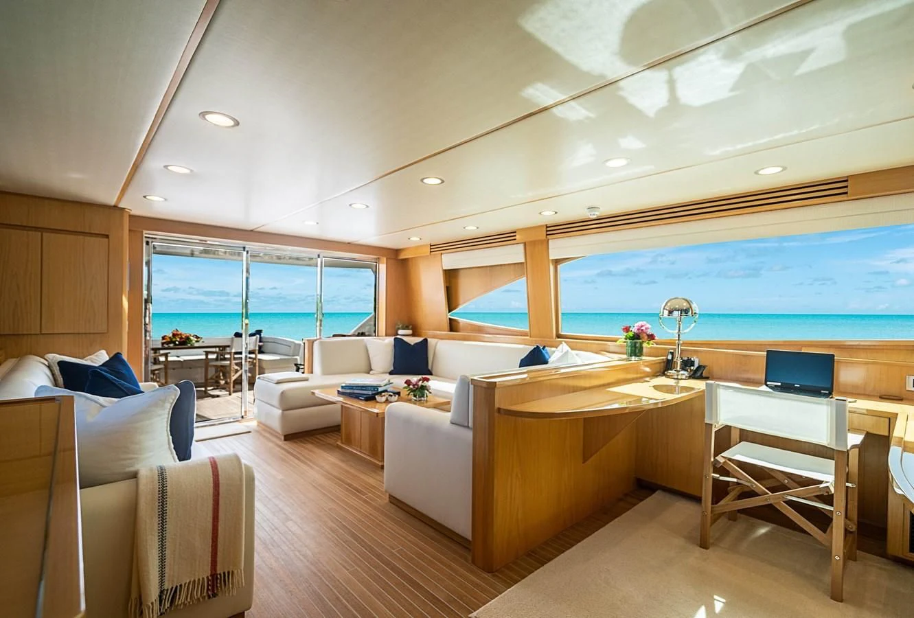 a living room with a large window aboard MARYBELLE Yacht for Sale