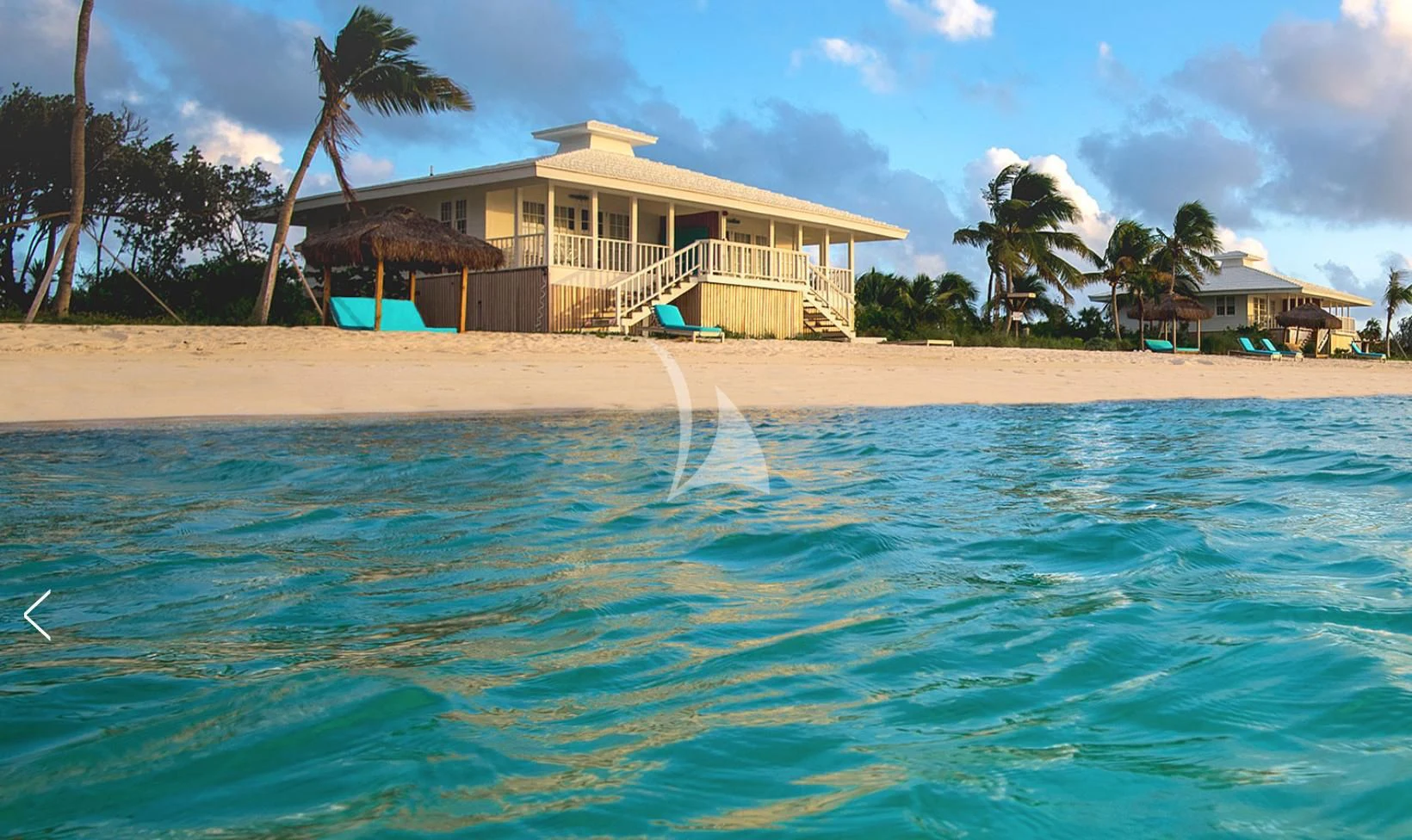 a house on a beach aboard MARYBELLE Yacht for Sale